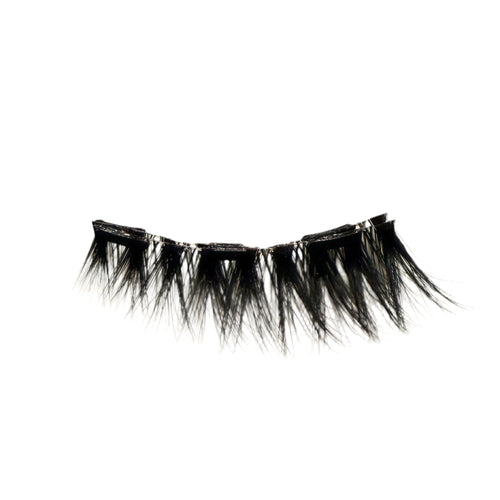 Wispy, pointed cat-eye false eyelash on a white background.